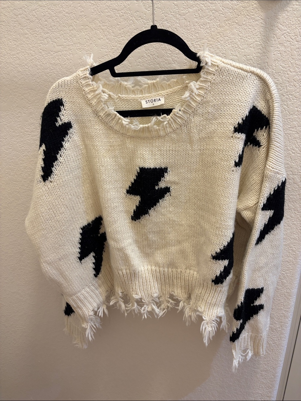 Storia Cream Sweater with Black Lightning Bolts